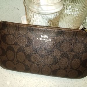 COACH Wristlet with phone pocket. NWOT
